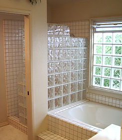 Decora pattern shower walls and window with vents.